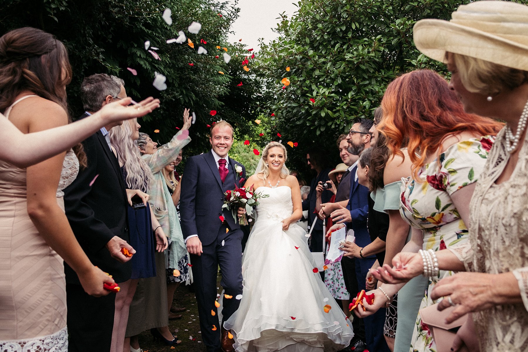 Newlyweds celebrating with their wedding guests